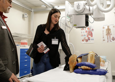 Guests examining some of the new equipment in the Radiography Lab